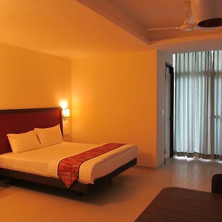 Ixora Suites Bangalore Habitación foto