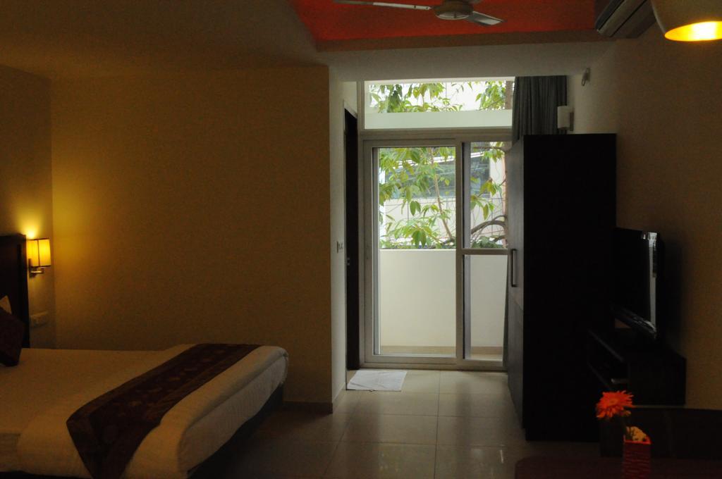 Ixora Suites Bangalore Habitación foto