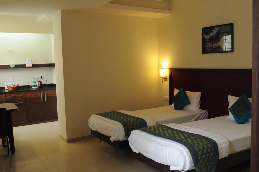 Ixora Suites Bangalore Habitación foto