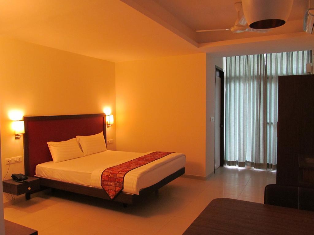 Ixora Suites Bangalore Habitación foto