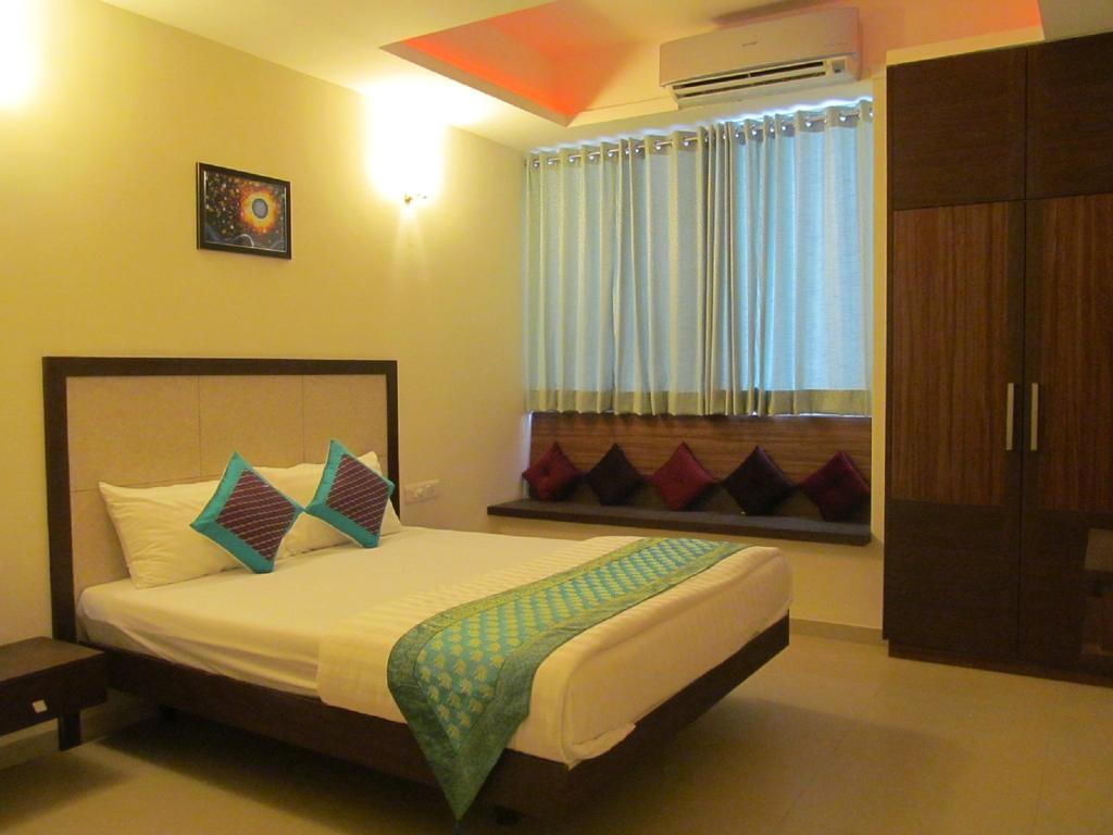 Ixora Suites Bangalore Habitación foto